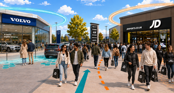 Shoppers walking through a retail park with digital geofence boundaries drawn around stores